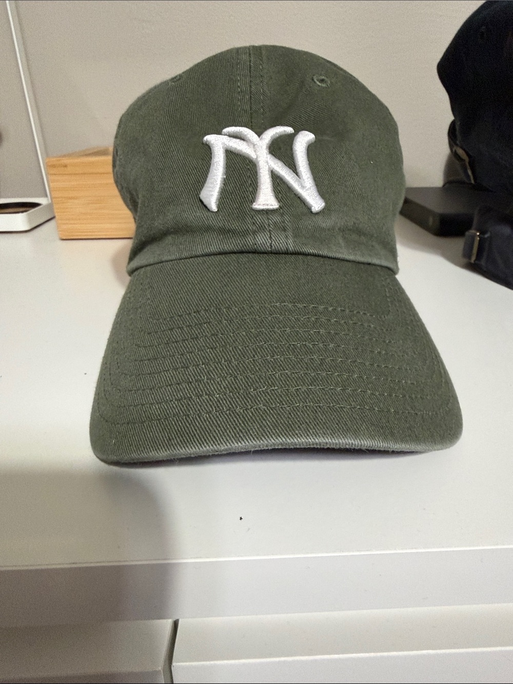 Olive Green NY Baseball Cap with White Embroidered Logo